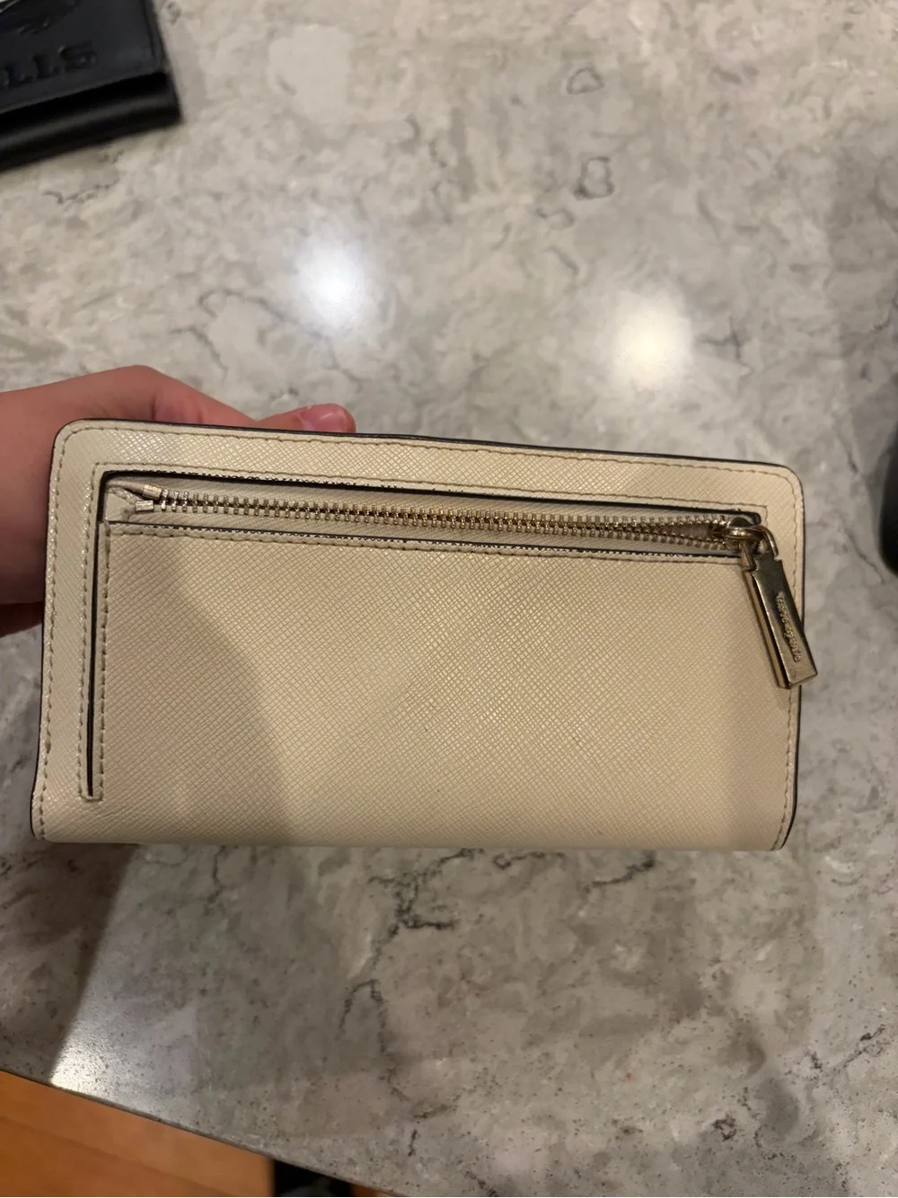 kate spade cream zip-around saffiano wallet with gold logo